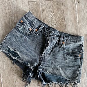 Levi’s 501 Jean shorts in distressed black denim